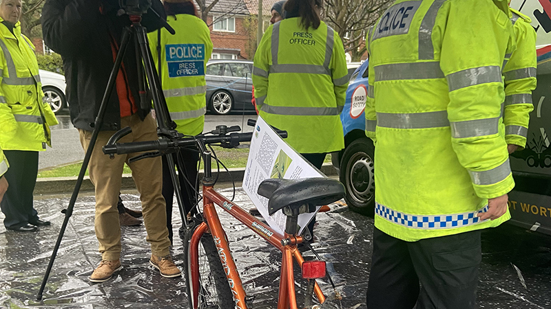 Police standing around a bike